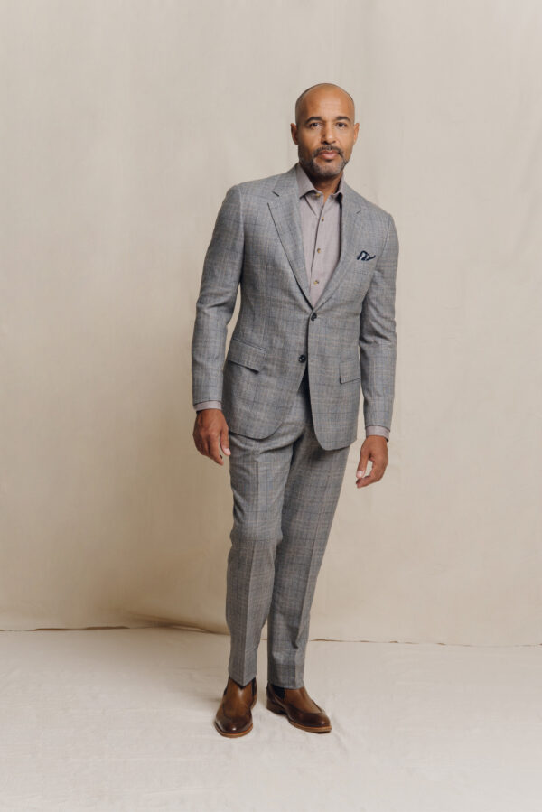 grey plaid custom suit with a novel approach in design